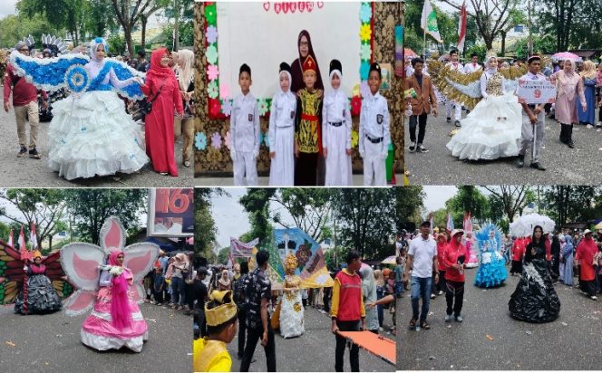 
 Para siswa/i mengenakan seragam adat dan karya kreatif dalam menyemarakkan Pawai Alegoris di Kota Langsa.