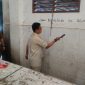 Wali Kota Langsa Jeffry Sentana memukul palu secara simbolis untuk merobohkan dinding pasar ikan yang tidak bermanfaat.